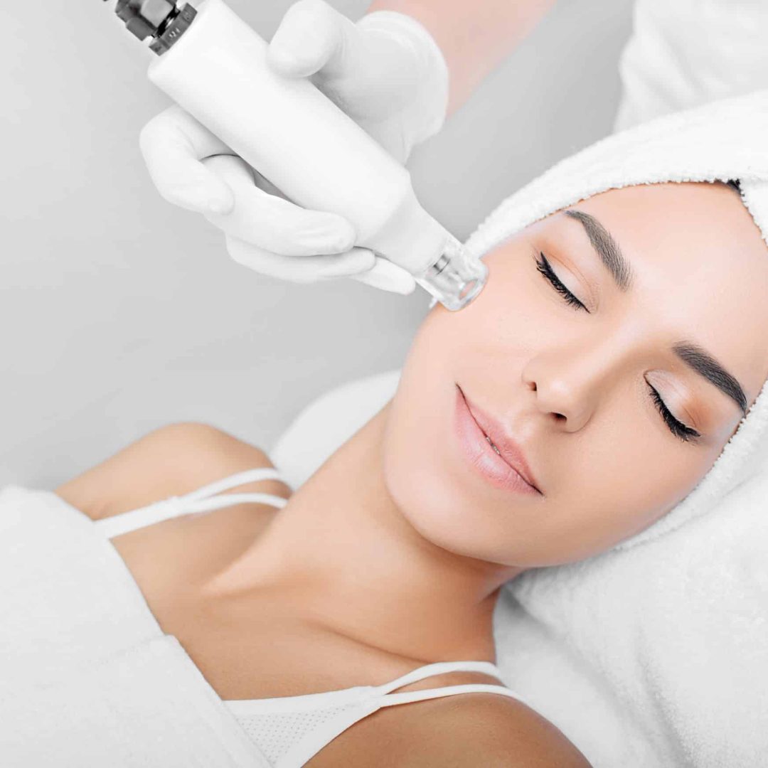 procedure renewing skin , no-needle high frequency mesotherapy woman receiving no-needle high frequency mesotherapy at beauty salon. non-invasive procedure for skin rejuvenation